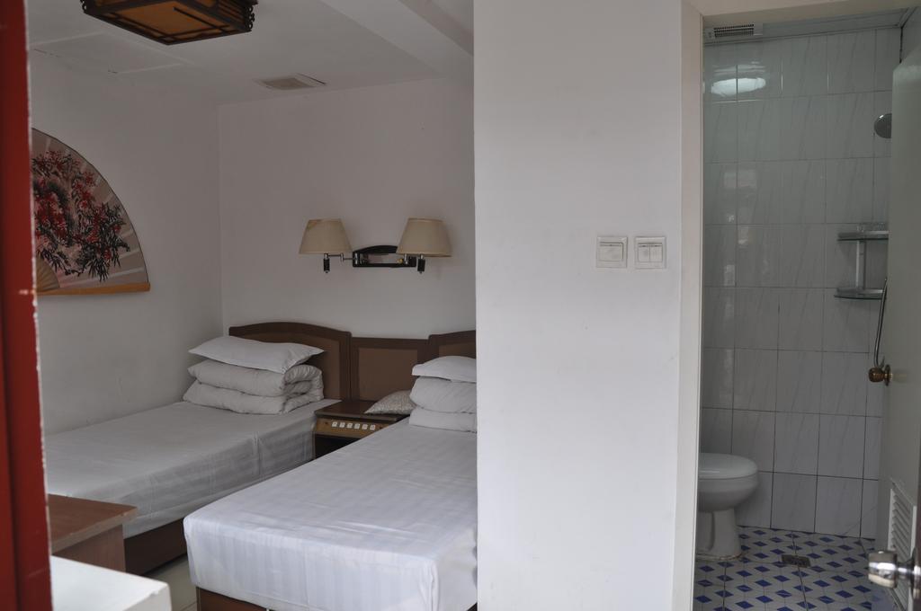 Three Legged Frog Hostel Πεκίνο Δωμάτιο φωτογραφία